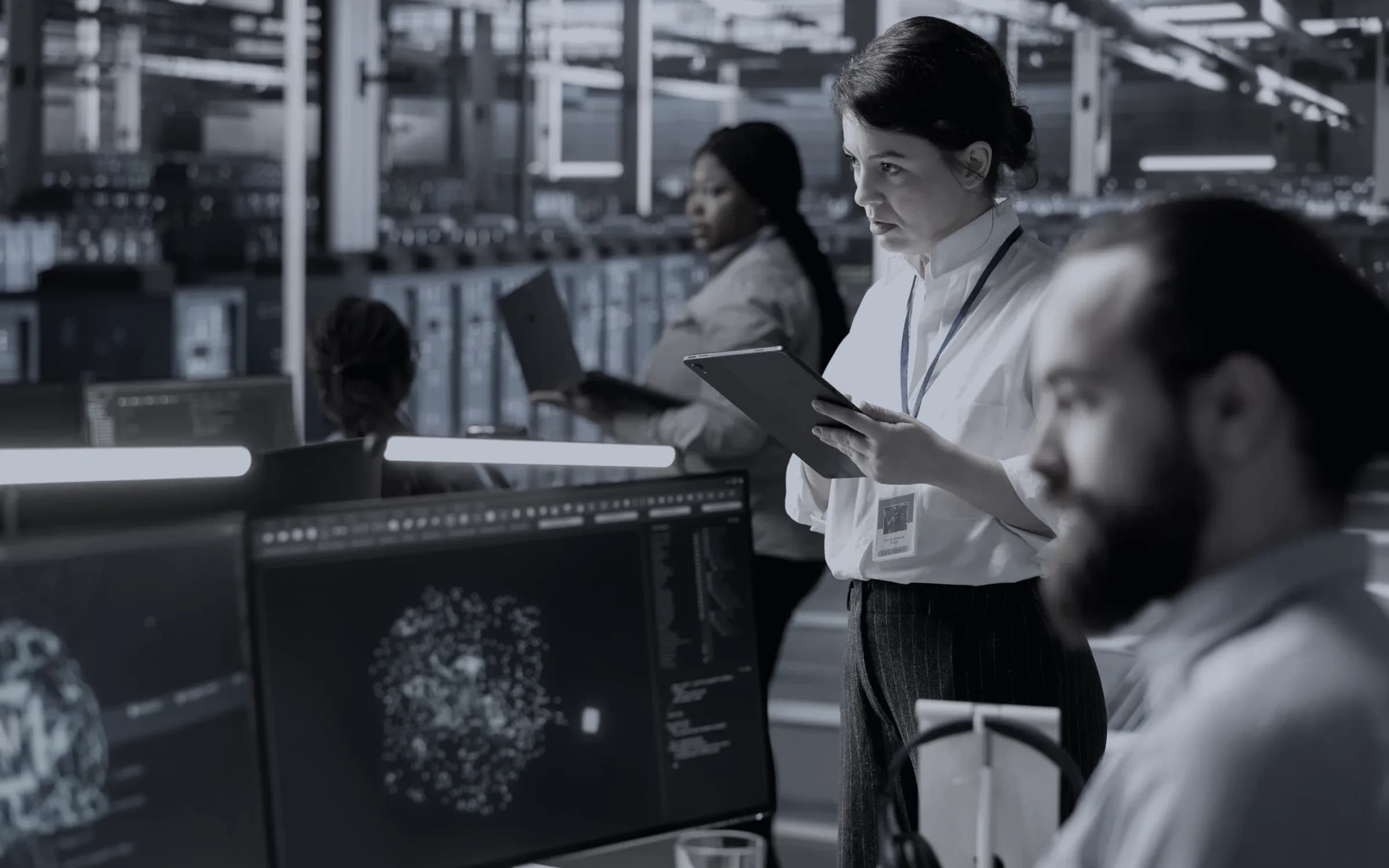 A data-centre floor where model workloads are monitored