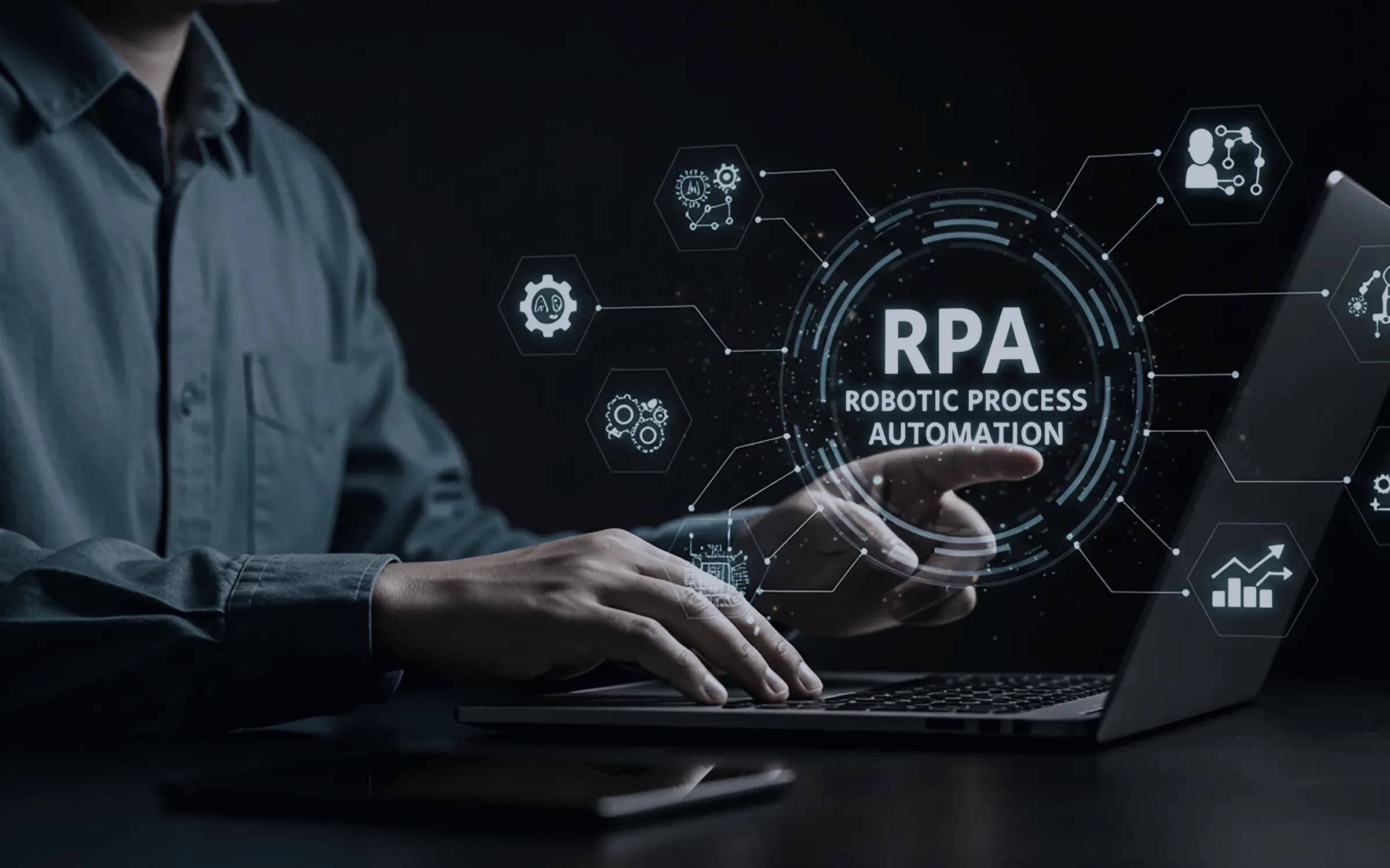 An operator running robotic process automation from a laptop