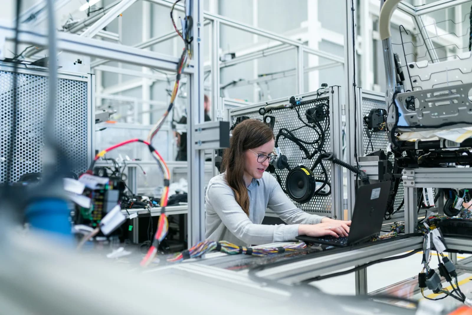 Robot arms in a robotics bay